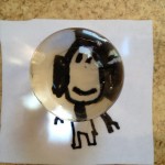 Magnifying with polymer spheres