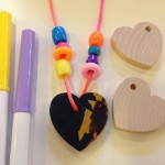Stringing wooden hearts