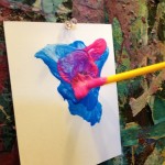 Paintbrushes at the easel wall