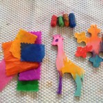 Wooden ornaments and color-bleed tissue paper