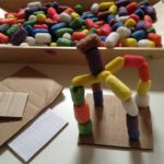 Cornstarch builders with cardboard bases