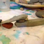 Painting with rocks and water